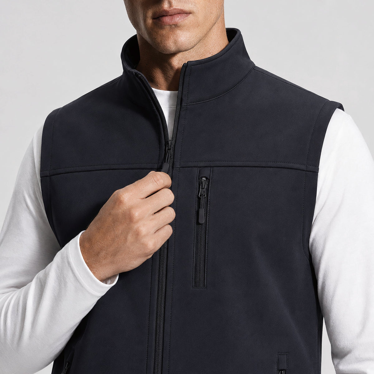 Black MAGCOMSEN Men's Waterproof Softshell Vest 6-Pocket Fleece Lined Golf Windbreaker in #Color_Black