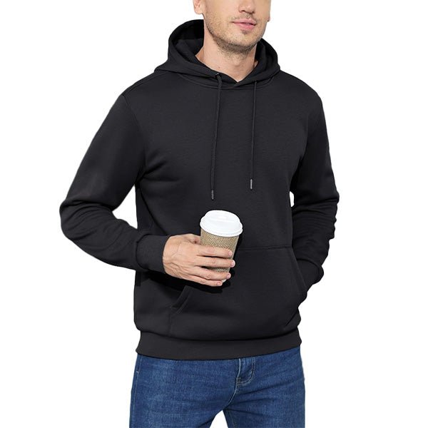 Man wearing a MAGCOMSEN fleece lined workout hoodie